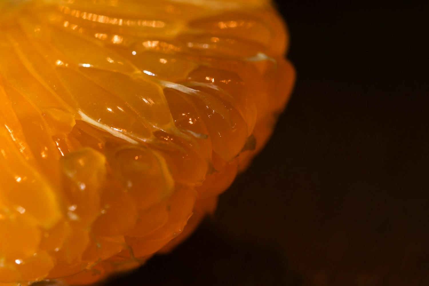 en appelsin fotografet med makroobjektiv